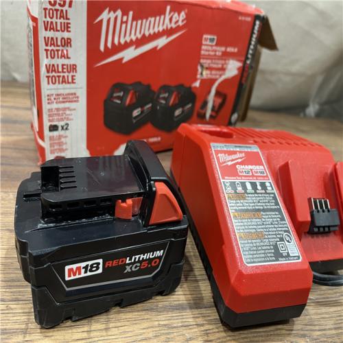AS-IS Milwaukee M18 18-Volt Lithium-Ion XC Starter Kit with Two 5.0Ah Batteries and Charger