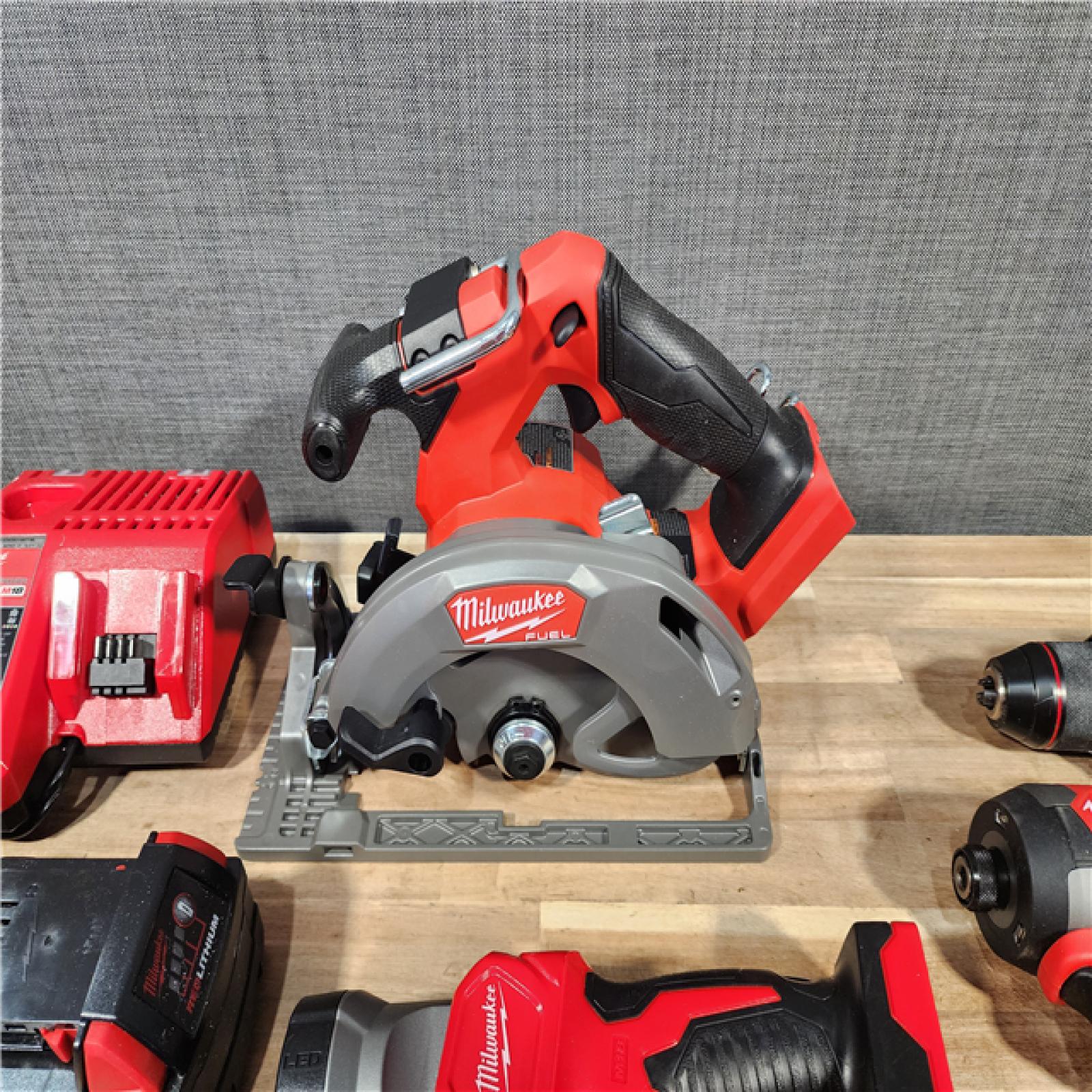 HOUSTON LOCATION - AS-IS M18 FUEL 18V Lithium-Ion Brushless Cordless Combo Kit (5-Tool) with Two 5.0 Ah Batteries  1 Charger 1 Tool Bag