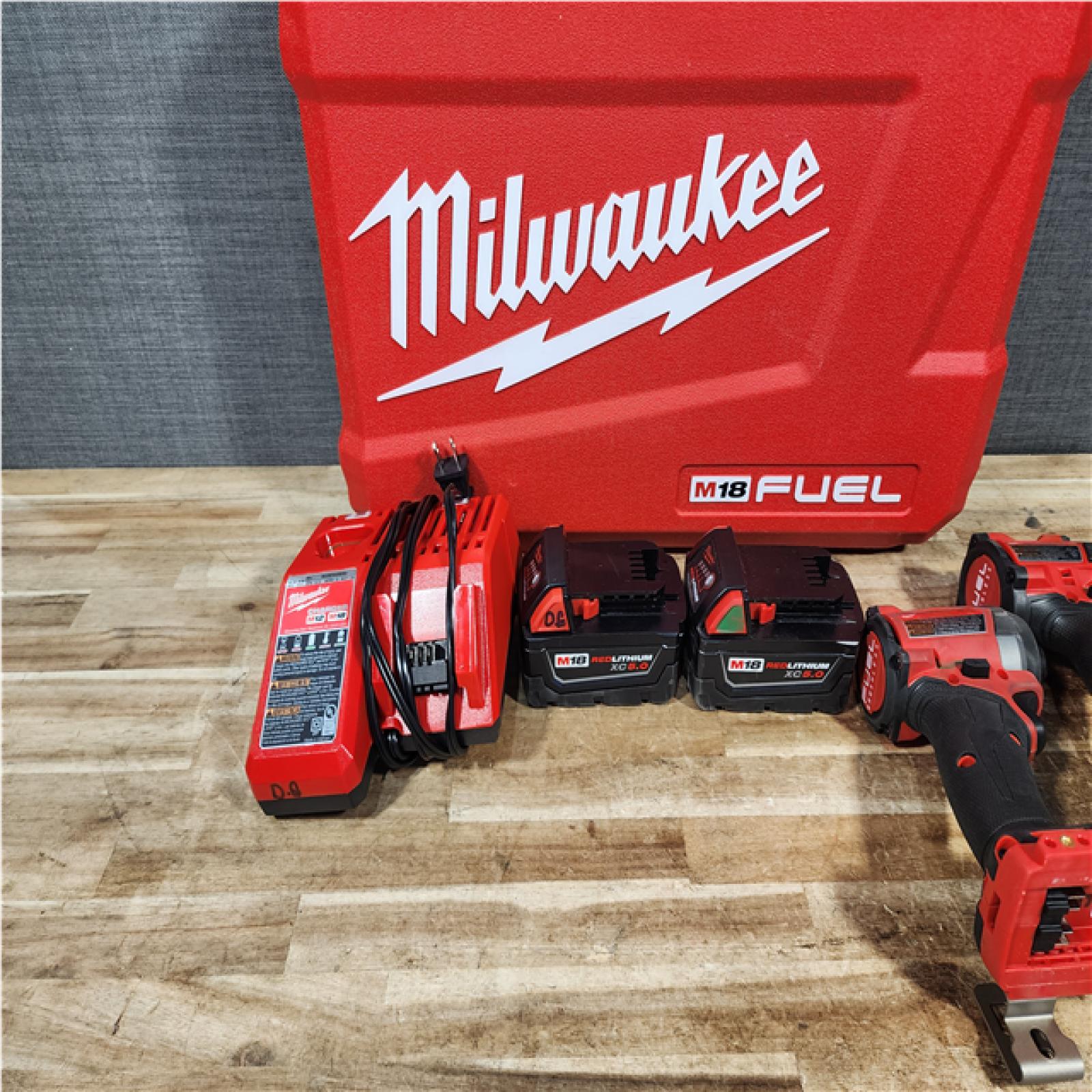 HOUSTON LOCATION - AS - IS Milwaukee FUEL 18V Lithium-Ion Brushless Cordless Hammer Drill and Impact Driver Combo Kit