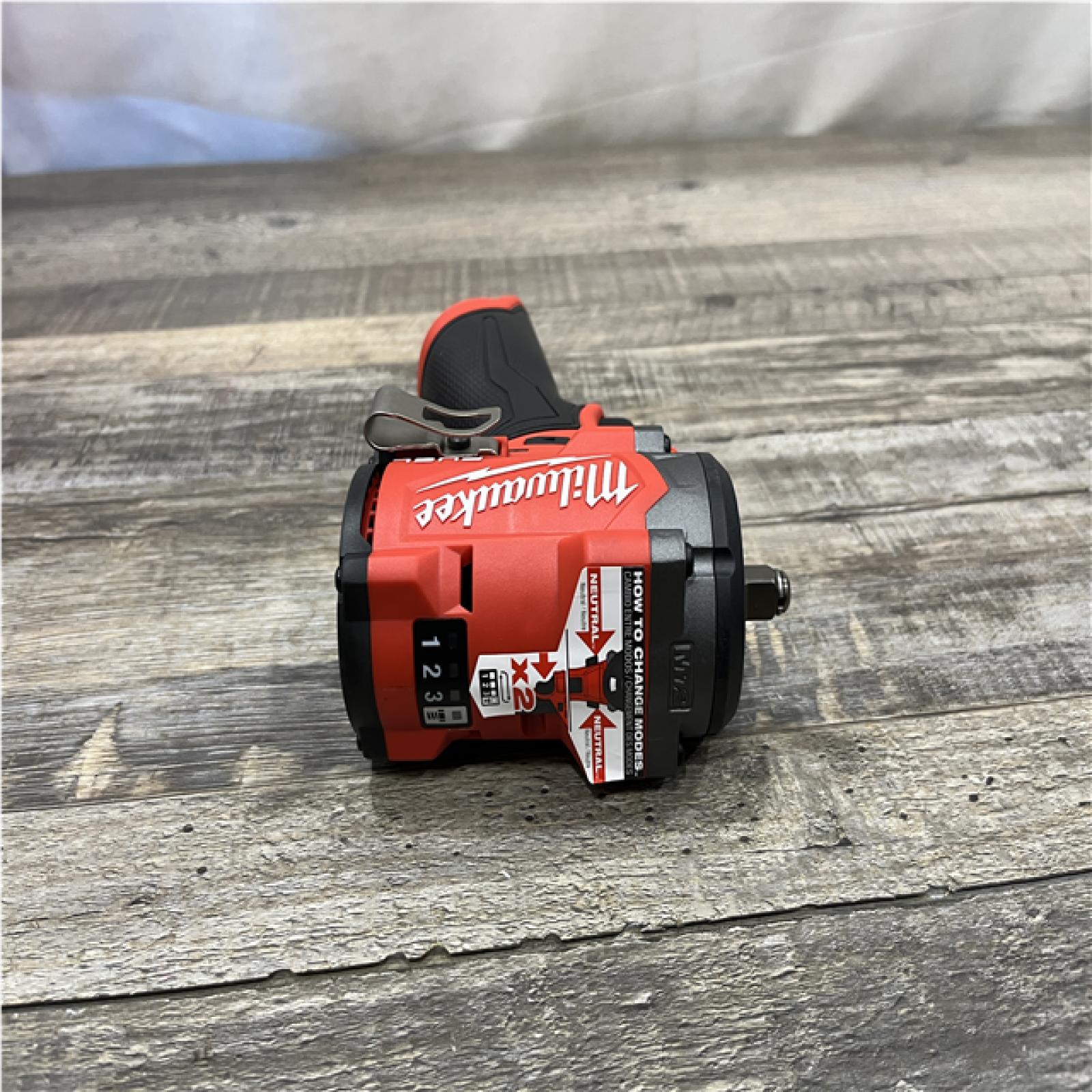 AS-IS Milwaukee FUEL 12V Li-Ion Brushless Cordless Stubby 3/8 in. Impact Wrench Kit