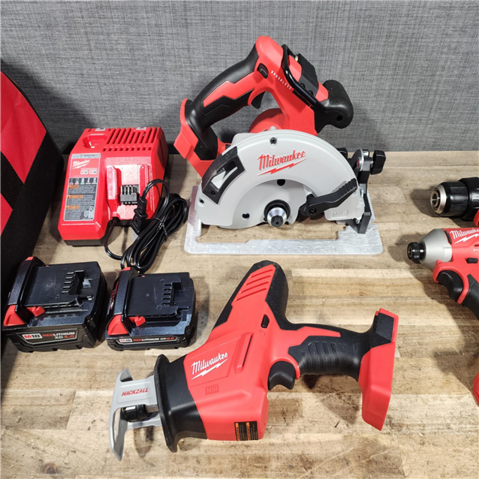 HOUSTON LOCATION - AS-IS Milwaukee M18 4-Tool Combo Kit