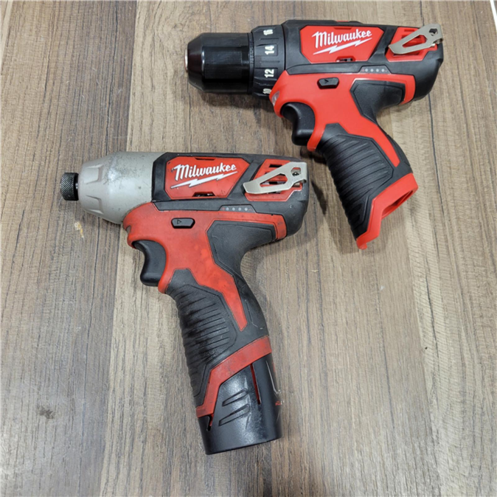 AS-IS Milwaukee    M12 12V Lithium-Ion Cordless Drill Driver/Impact Driver Combo Kit with Two 1.5Ah Batteries, Charger and Bag (2-Tool)