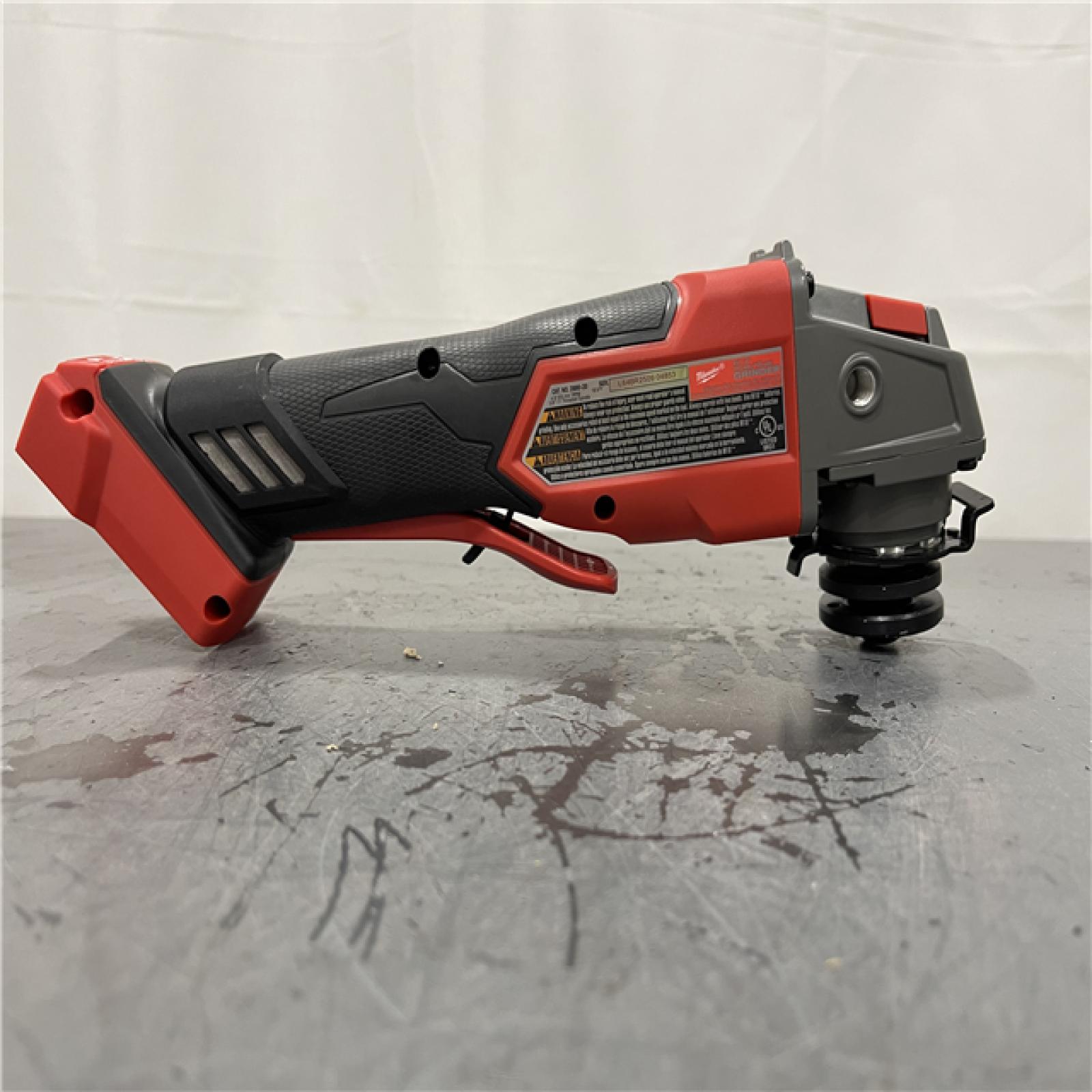 AS-IS - Milwaukee M18 FUEL 18V Lithium-Ion Brushless Cordless 4-1/2 in./5 in. Grinder w/Paddle Switch