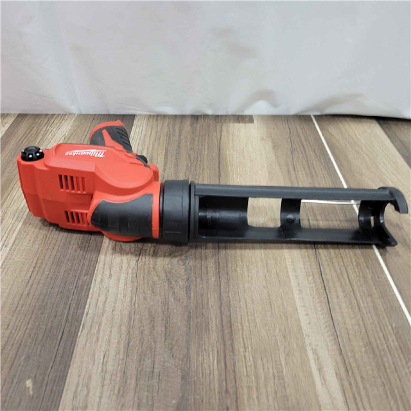 AS-IS  Milwaukee 2441-20 M12 12V Cordless 10oz Caulk and  (Tool Only)