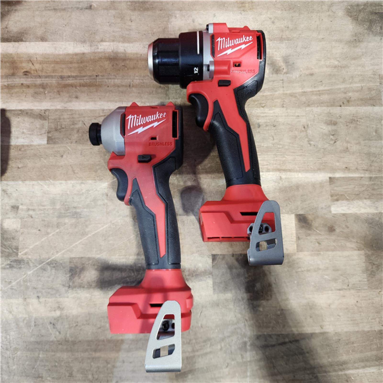HOUSTON LOCATION - AS-IS Milwaukee M18 18V Lithium-Ion Brushless Cordless Compact Drill/Impact Combo Kit (2-Tool) W/(2) 2.0 Ah Batteries  Charger & Bag