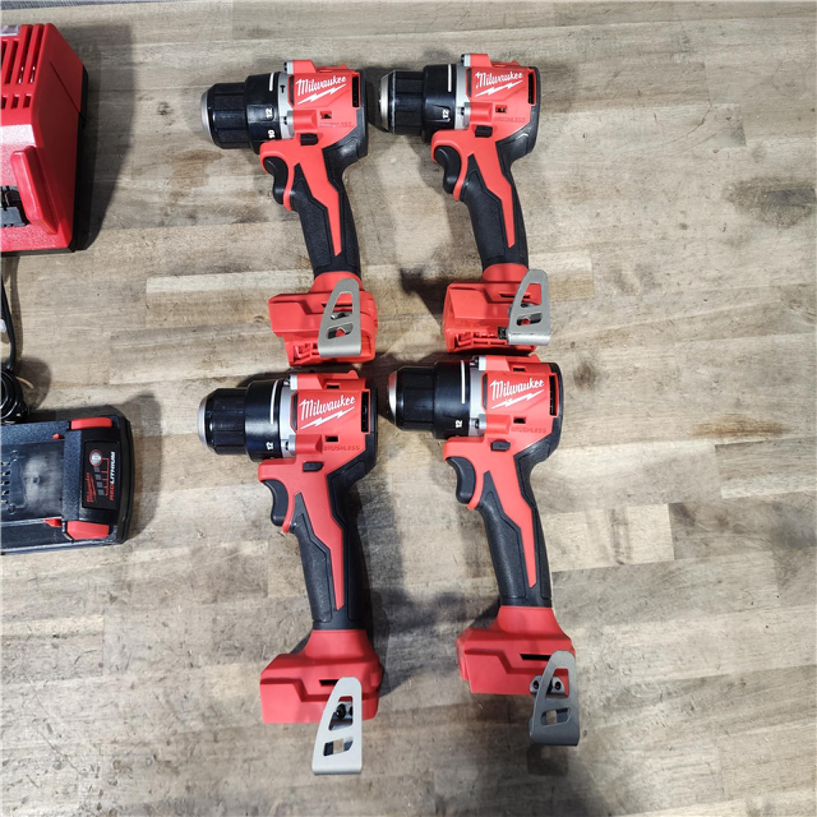 HOUSTON LOCATION - AS-IS MILWAUKEE 4 TOOL COMBO KIT W/ (2) BATTERY & CHARGER