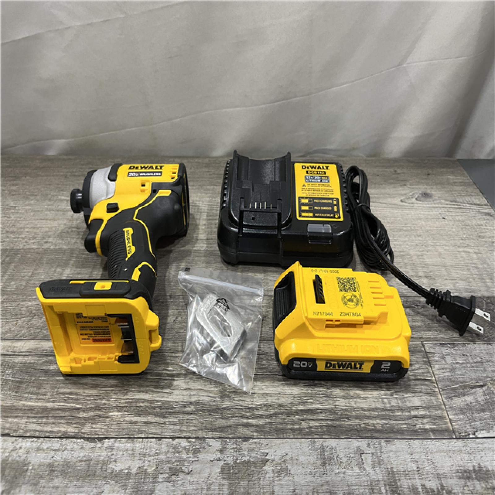 AS-IS DEWALT Atomic 20V Max Lithium-Ion Brushless Cordless Compact 1/4 in. Impact Driver Kit