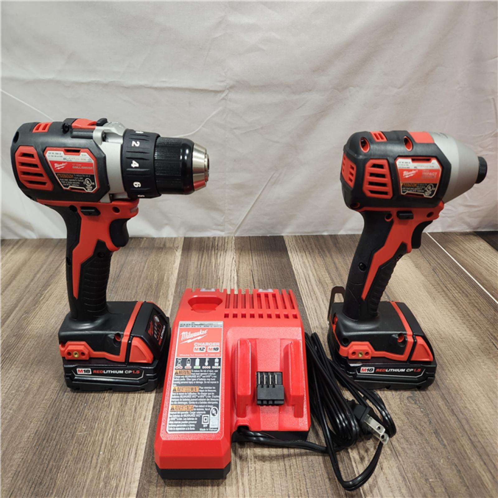 AS-IS- Milwaukee 18V Cordless Brushed 2-Tool Drill/Driver and Impact Driver Kit