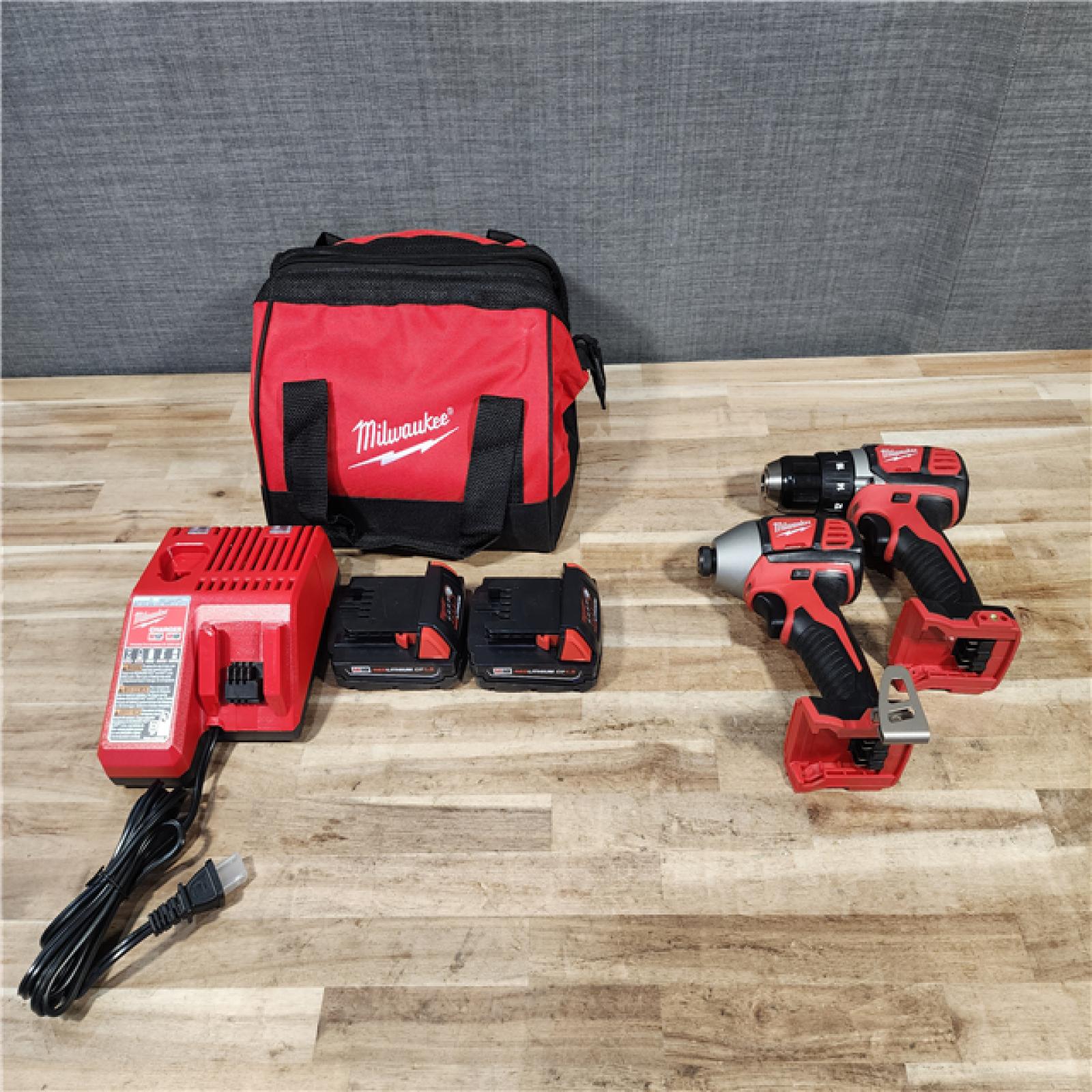 HOUSTON LOCATION - AS-IS Milwaukee 18V Lithium-Ion Cordless Drill Driver/Impact Driver Combo Kit