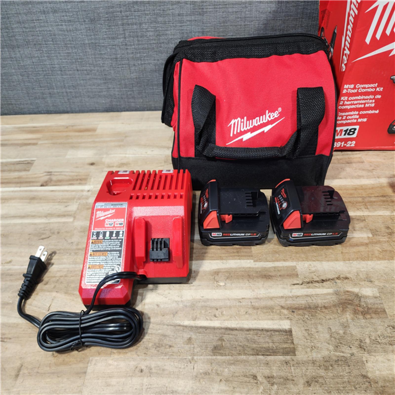 HOUSTON LOCATION - AS-IS Milwaukee 18V Lithium-Ion Cordless Drill Driver/Impact Driver Combo Kit