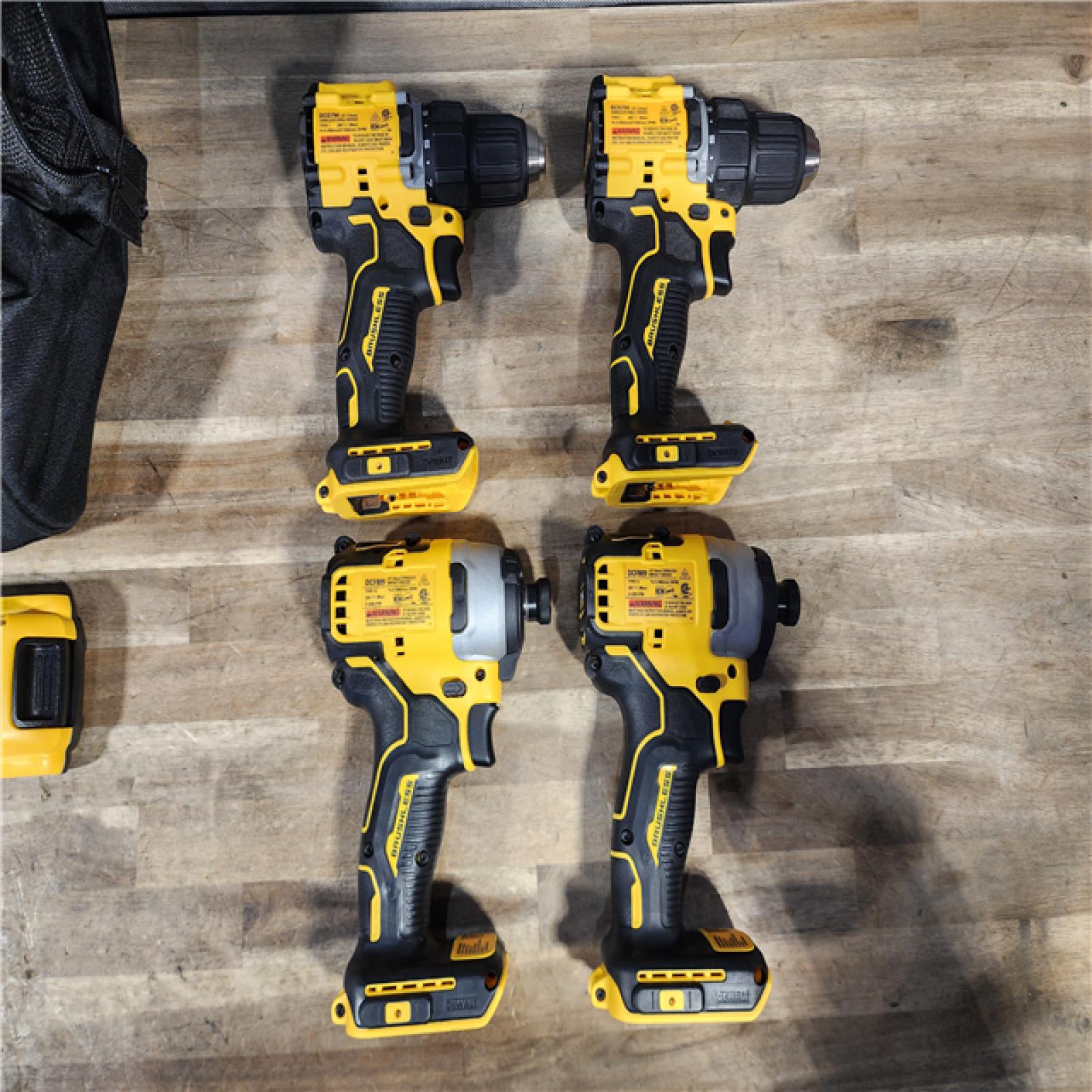 HOUSTON LOCATION - AS-IS DeWalt 20V MAX ATOMIC Cordless Brushless 4-Tool Combo Kit