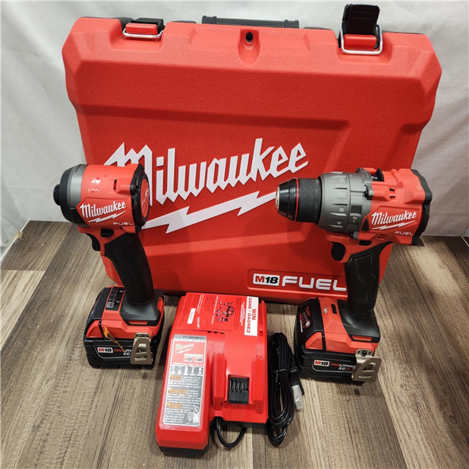 AS-IS- MILWAUKEE FUEL 18V Lithium-Ion Brushless Cordless Hammer Drill and Impact Driver Combo Kit