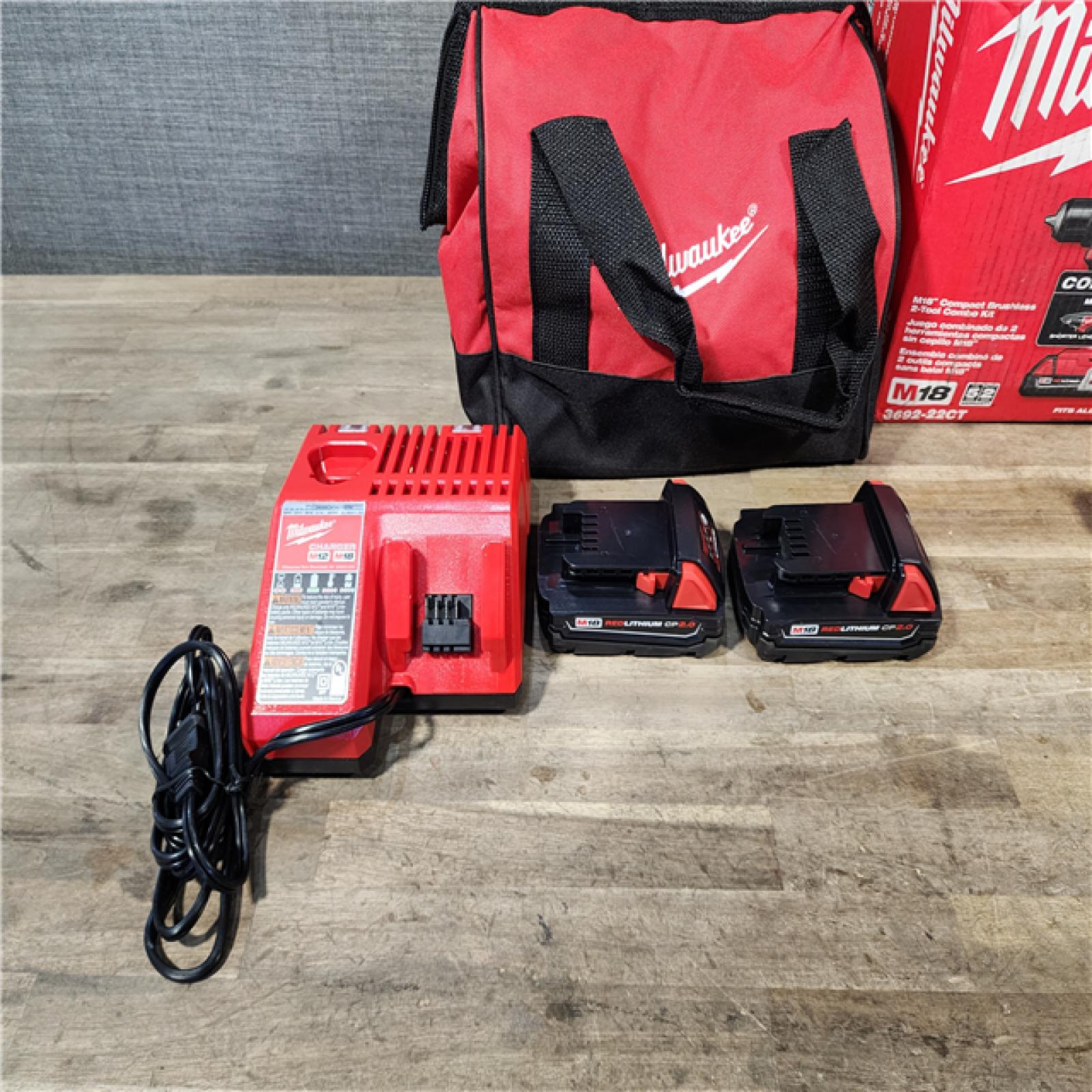 HOUSTON LOCATION - AS-IS Milwaukee M18 18V Lithium-Ion Brushless Cordless Compact Drill/Impact Combo Kit (2-Tool) W/(2) 2.0 Ah Batteries  Charger & Bag