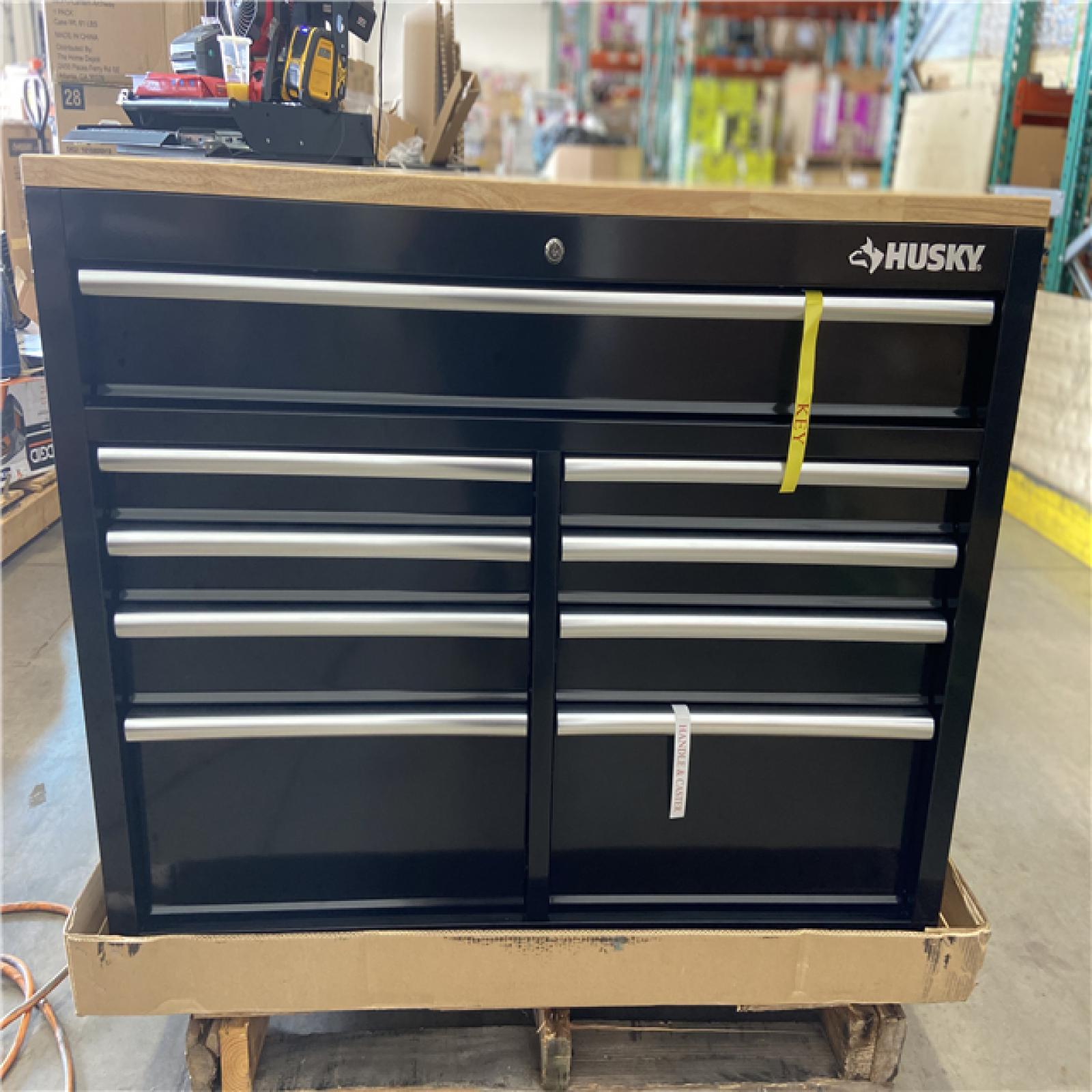 DALLAS LOCATION  - Husky Tool Storage 46 in. W x 51 in. D Standard Duty Black Mobile Workbench Cabinet with Solid Top Full Length Extension Table