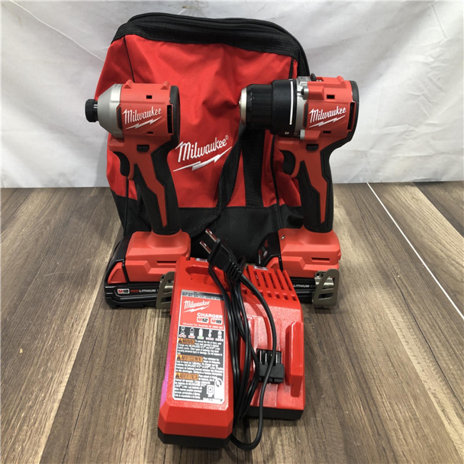 AS-IS Milwaukee 18V Lithium-Ion Brushless Cordless Compact Drill/Impact Combo Kit