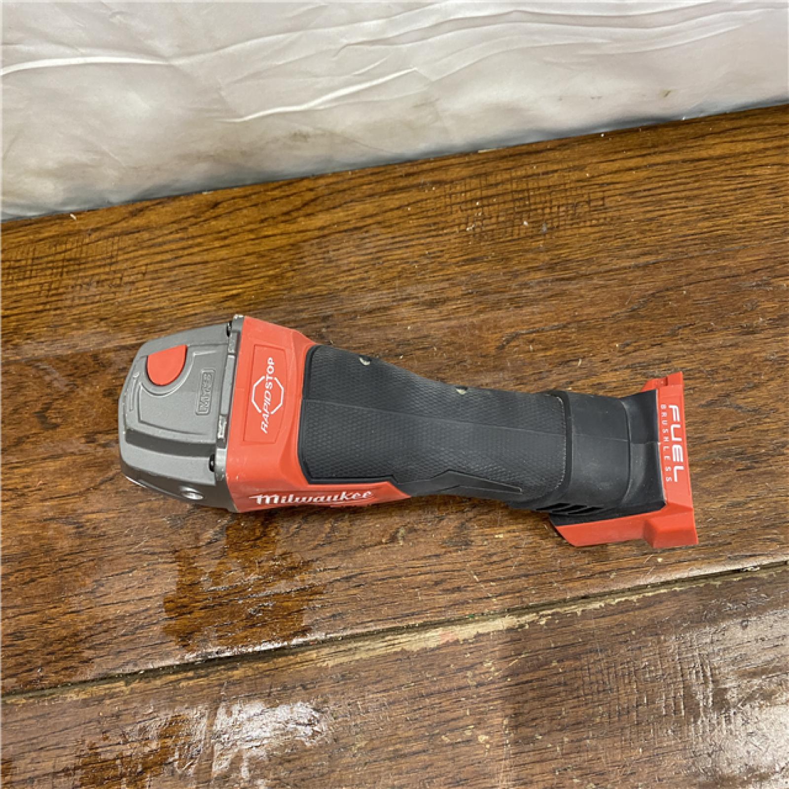 AS-IS Milwaukee 2880-20 M18 FUEL 18-Volt Lithium-Ion Brushless Cordless 4-1/2 in./5 in. Grinder W/Paddle Switch (Tool-Only)