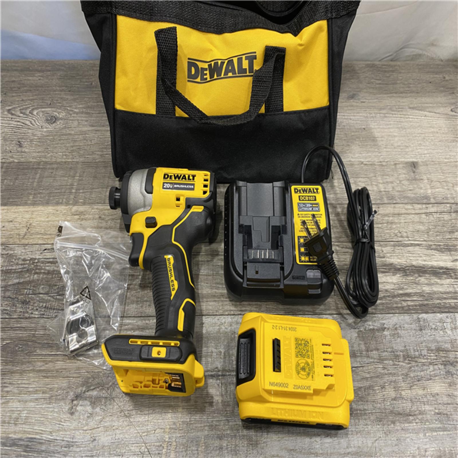 AS-IS DEWALT Atomic 20V Max Lithium-Ion Brushless Cordless Compact 1/4 in. Impact Driver Kit