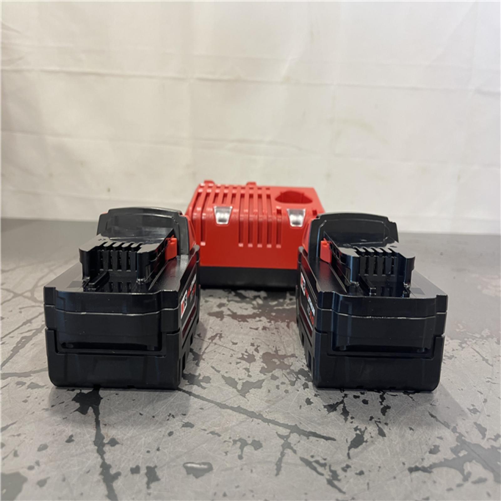 AS-IS- Milwaukee M18 18-Volt Lithium-Ion XC Starter Kit with Two 5.0Ah Batteries and Charger