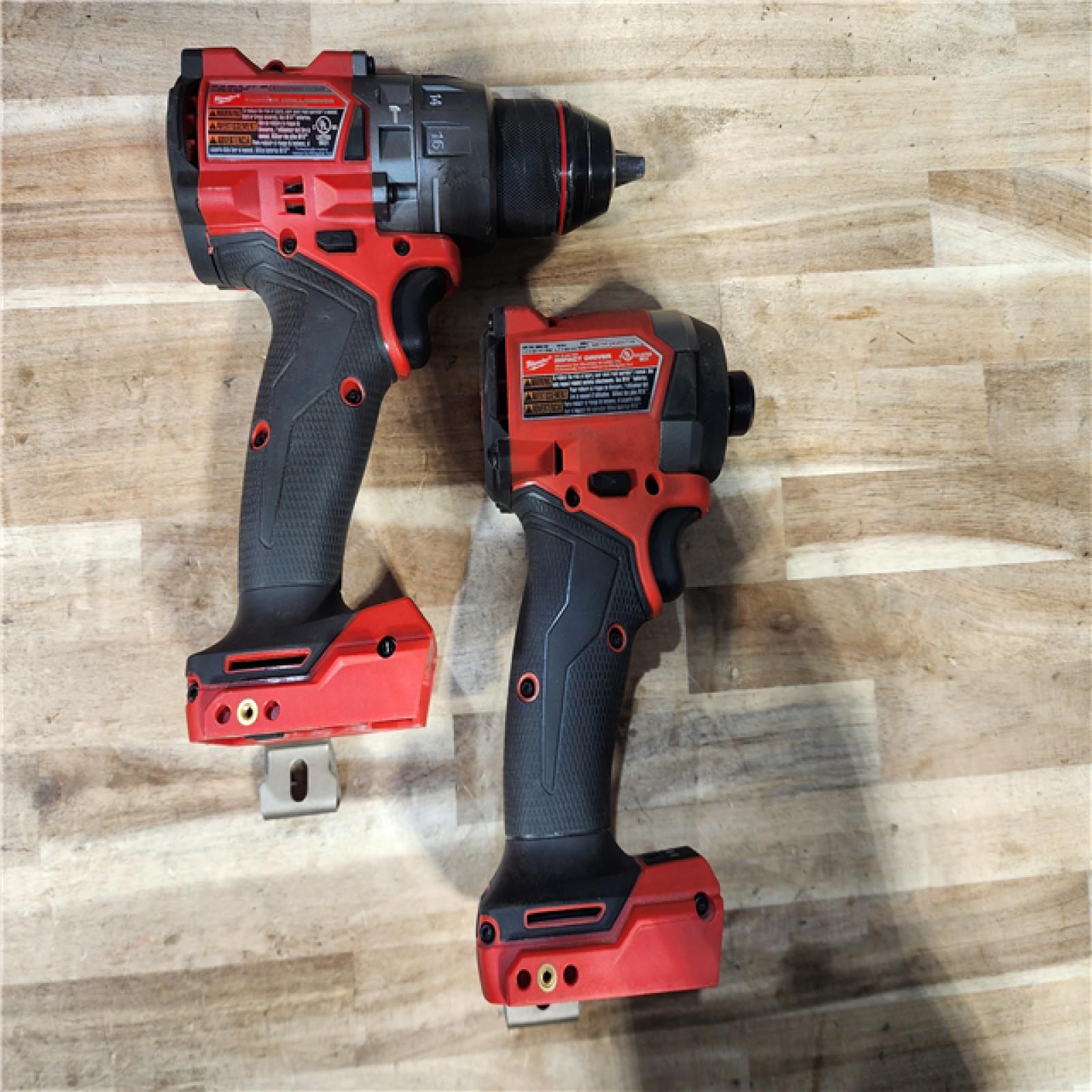 HOUSTON LOCATION - AS-IS Milwaukee FUEL 18V Lithium-Ion Brushless Cordless Hammer Drill and Impact Driver Combo Kit