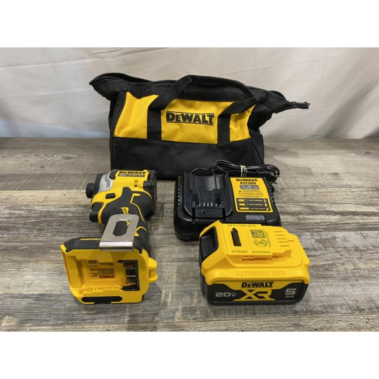 AS-IS DEWALT ATOMIC 20V MAX Lithium-Ion Cordless 1/4 in. Brushless Impact Driver Kit