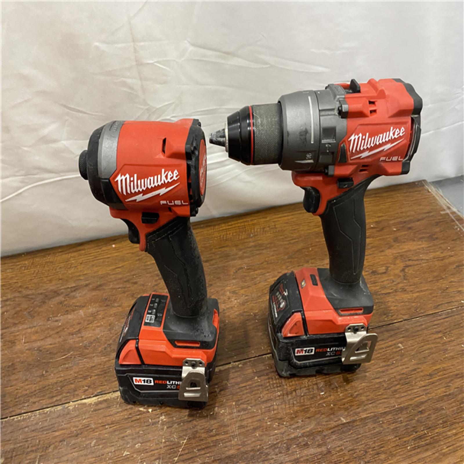 AS-IS M18 FUEL 18V Lithium-Ion Brushless Cordless Hammer Drill and Impact Driver Combo Kit (2-Tool) with 2 Batteries