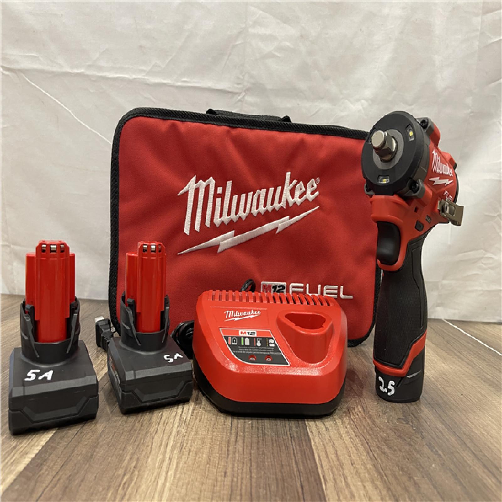 AS-IS- Milwaukee FUEL 12V Li-Ion Brushless Cordless Stubby 1/2 in. Impact Wrench Kit