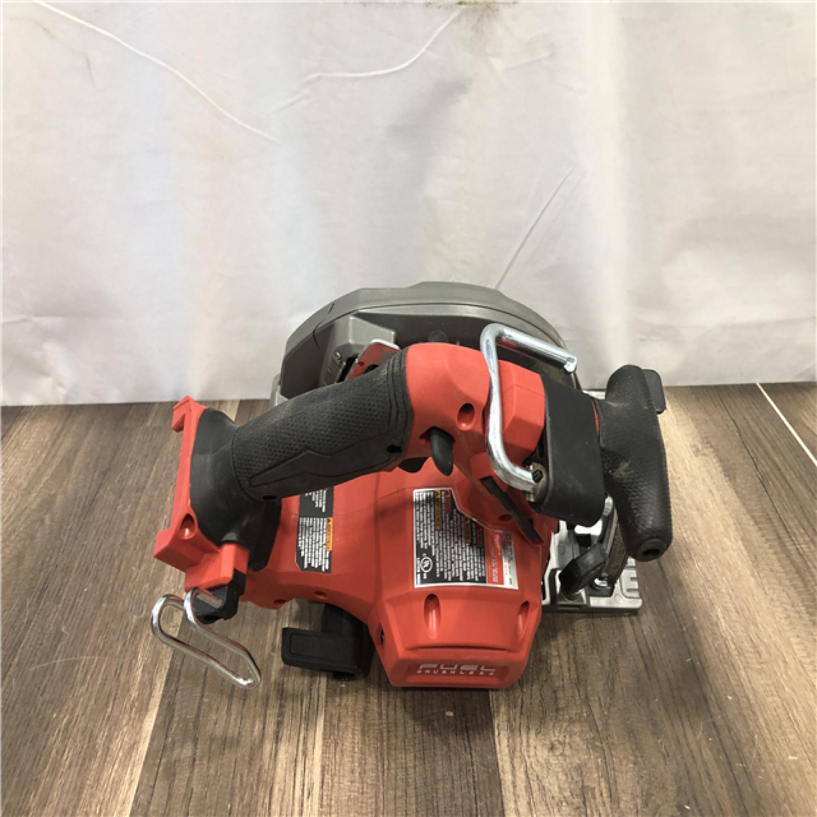 AS-IS Milwaukee FUEL 18V Lithium-Ion Brushless Cordless 6-1/2 in. Circular Saw (Tool-Only)