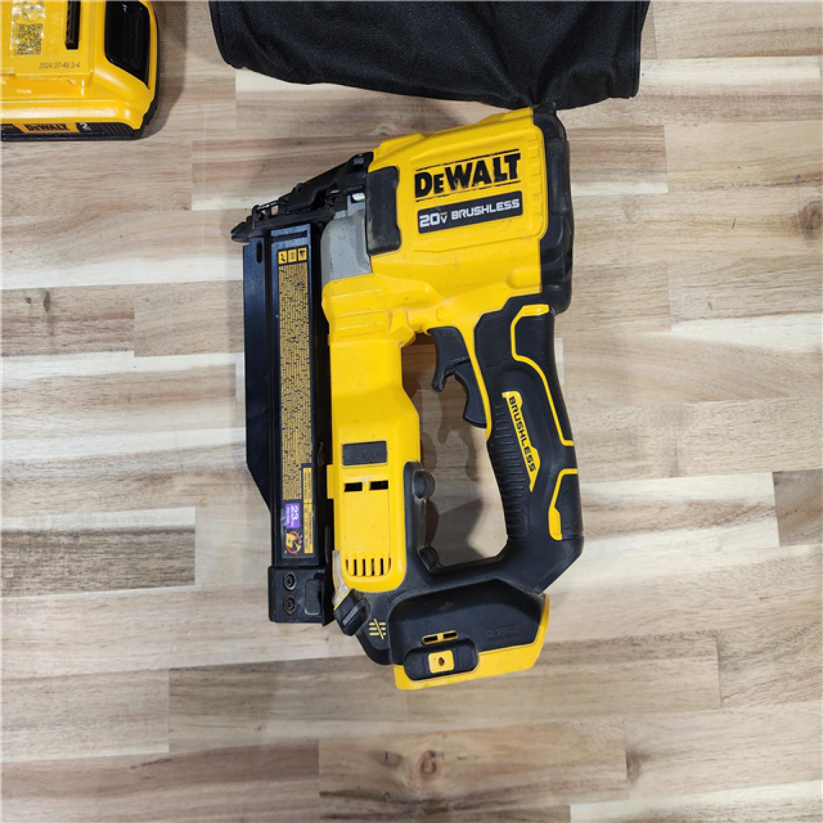 HOUSTON LOCATION - AS-IS DEWALT ATOMIC 20V MAX Lithium Ion Cordless 23 Gauge Pin Nailer Kit with 2.0Ah Battery and Charger