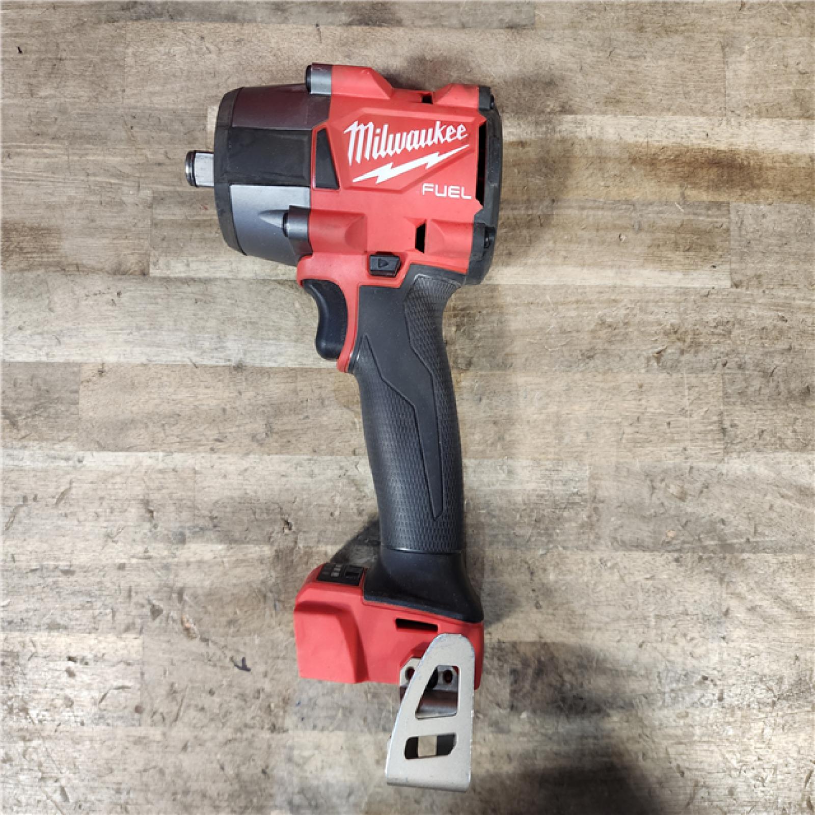 HOUSTON LOCATION - AS-IS Milwaukee 2962-20  M18 18V Fuel 1/2 Mid-Torque Impact Wrench Cordless Lithium-Ion Brushless (Tool-Only)