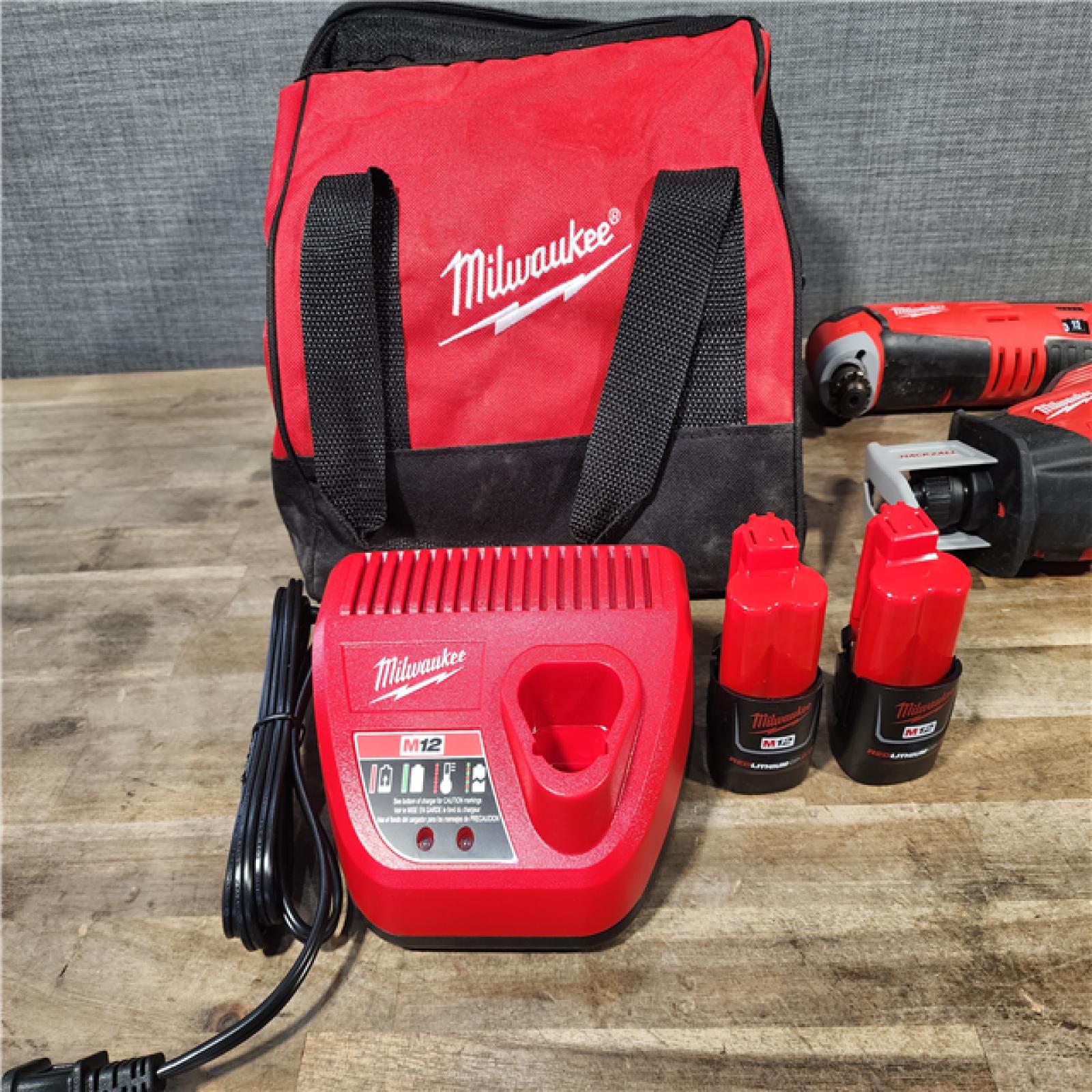 HOUSTON LOCATION - AS-IS MILWAUKEE 4 TOOL COMBO KIT W/ (2) BATTERY & CHARGER