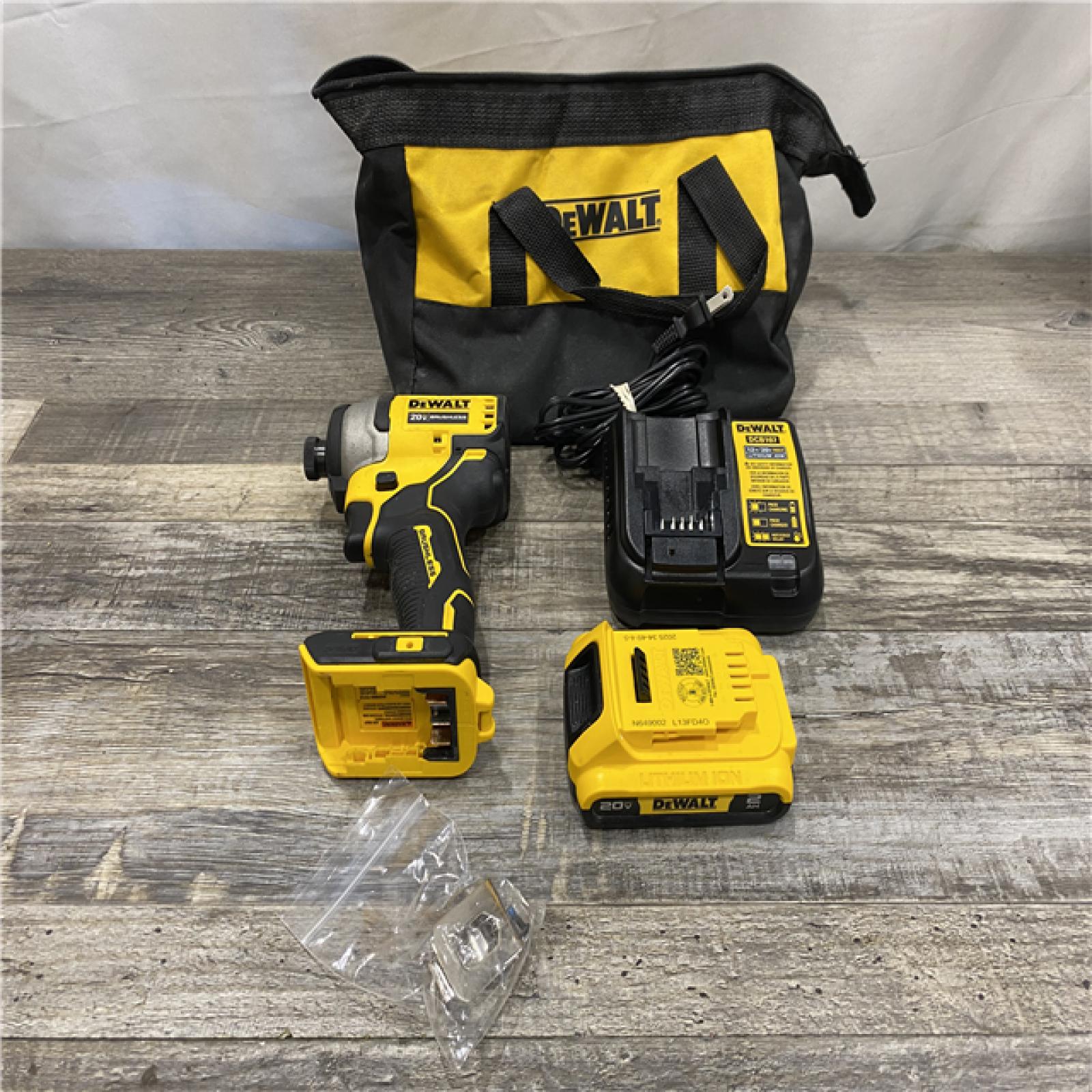 AS-IS DEWALT Atomic 20V Max Lithium-Ion Brushless Cordless Compact 1/4 in. Impact Driver Kit