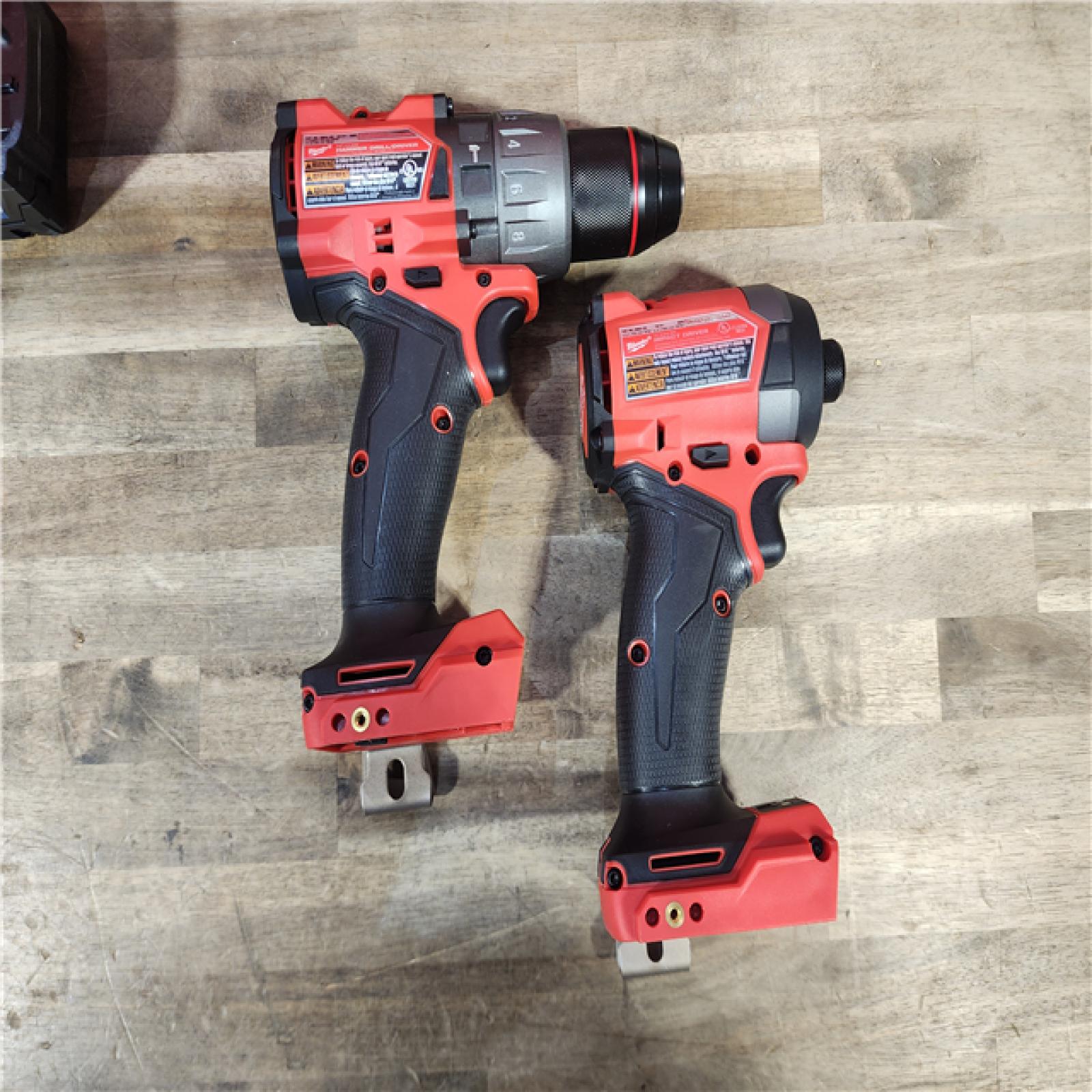 HOUSTON LOCATION - AS-IS (APPEARS LIKE NEW) MILWAUKEE M18 FUEL 18V Lithium-Ion Brushless Cordless Hammer Drill and Impact Driver Combo Kit (2-Tool) with 2 Batteries