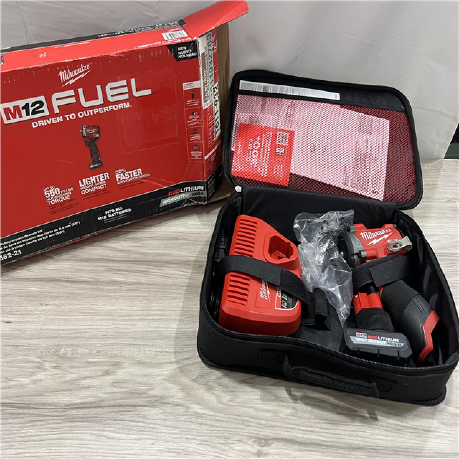 AS-IS Milwaukee FUEL 12V Li-Ion Brushless Cordless Stubby 3/8 in. Impact Wrench Kit