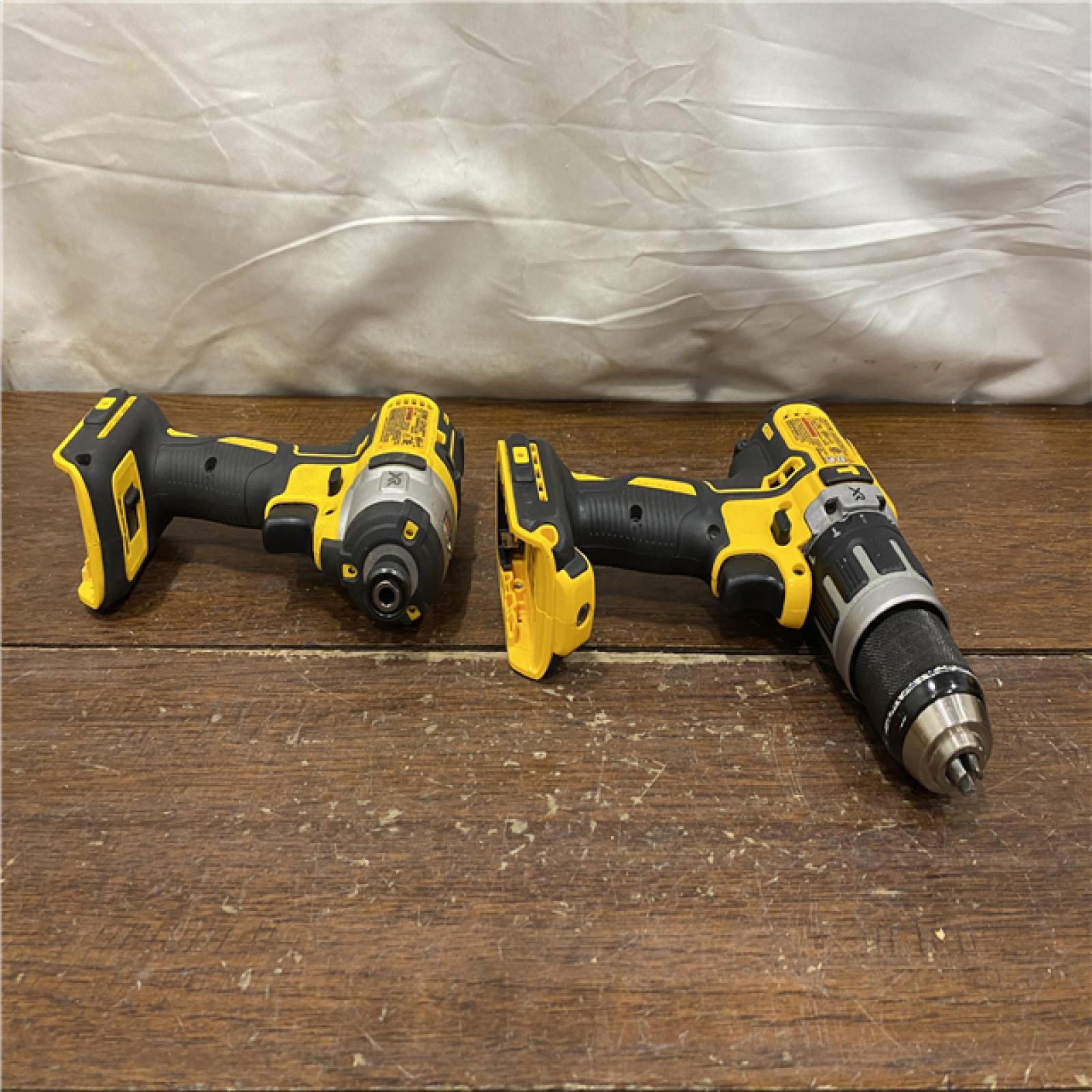 AS-IS DEWALT 20V MAX XR Hammer Drill and ATOMIC Impact Driver 2 Tool Cordless Combo Kit with (2) 4.0Ah Batteries, Charger, and Bag