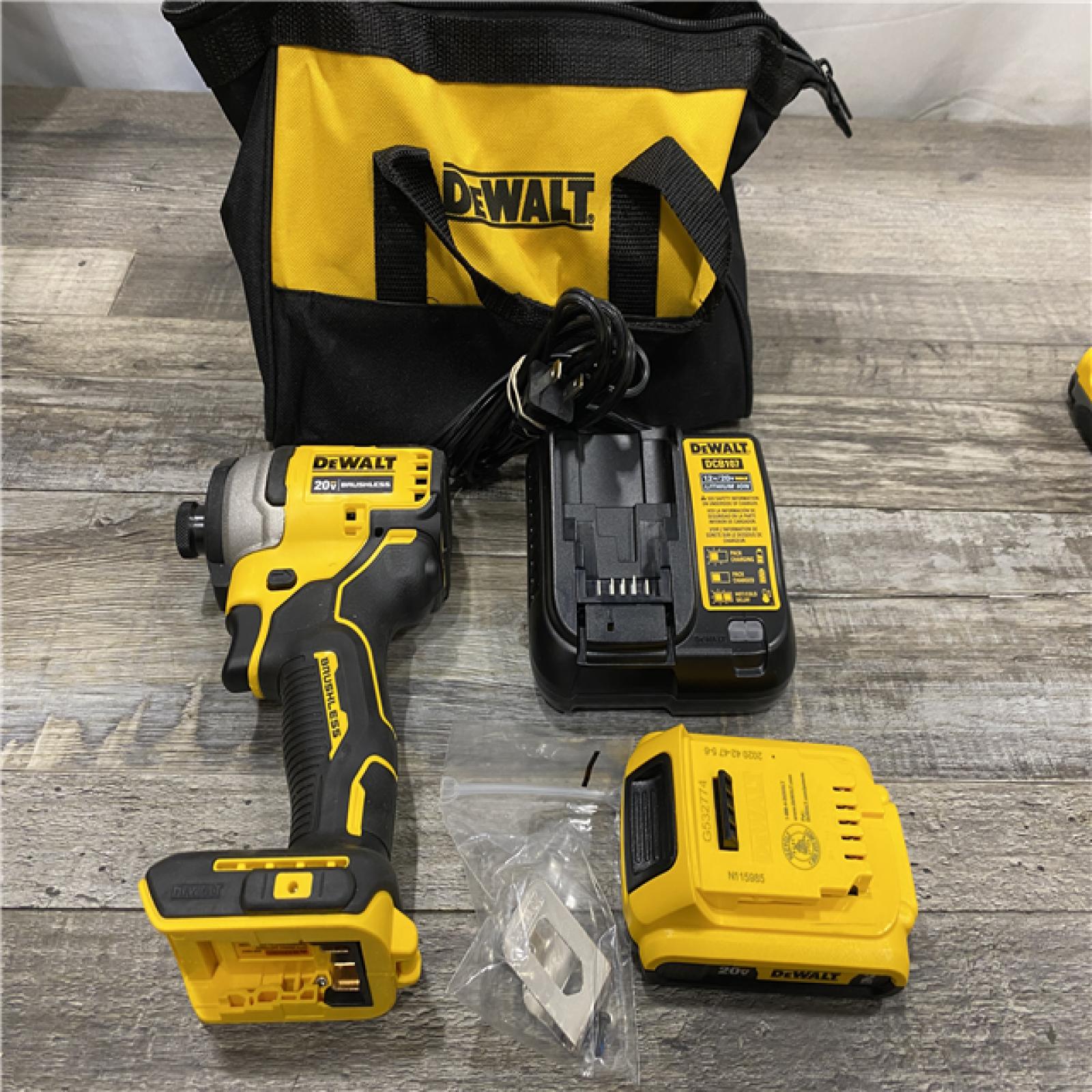 AS-IS DEWALT Atomic 20V Max Lithium-Ion Brushless Cordless Compact 1/4 in. Impact Driver Kit