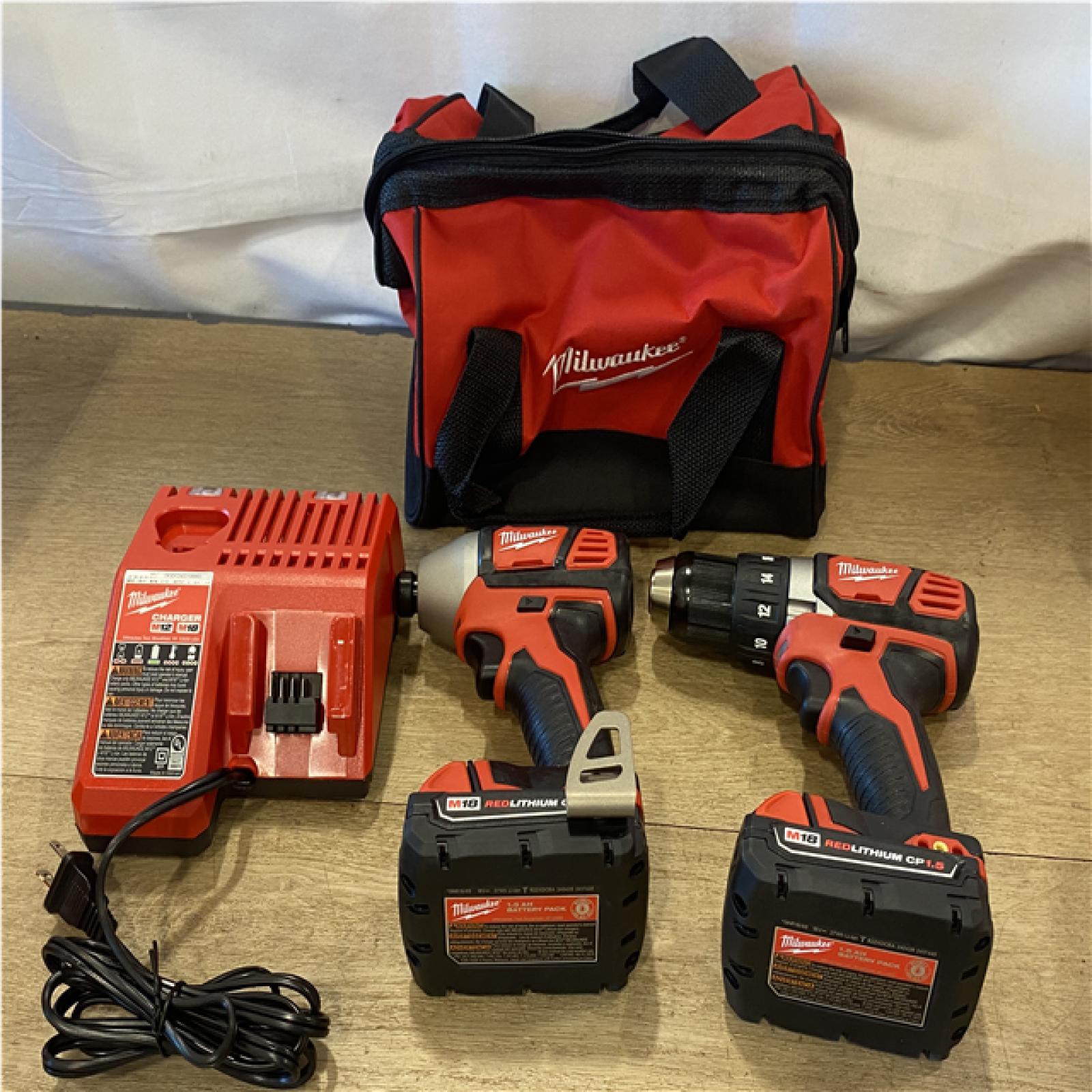 AS-IS Milwaukee 18V Lithium-Ion Cordless Drill Driver/Impact Driver Combo Kit
