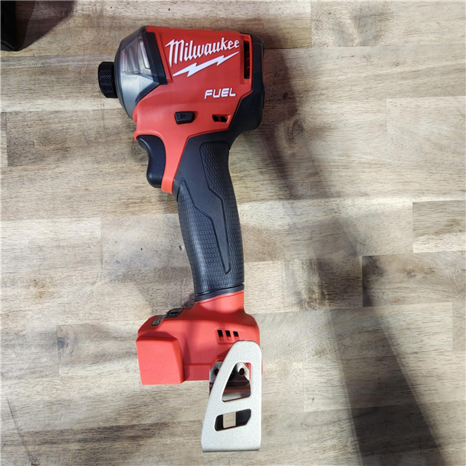 HOUSTON LOCATION - AS-IS (APPEARS LIKE NEW) Milwaukee M18 FUEL SURGE 18-Volt Lithium-Ion Brushless Cordless 1/4 in. Hex Impact Driver Compact Kit with Two 5.0 Ah Batteries