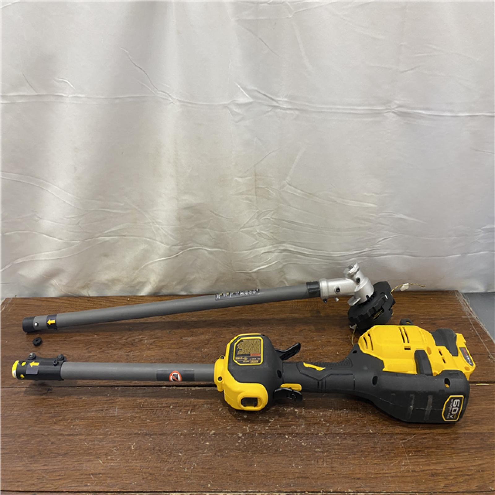 AS-IS DEWALT FLEXVOLT 60V MAX 17 in. Cordless Battery Powered Attachment Capable Trimmer Kit with (1) FLEXVOLT 3 Ah Battery & Charger