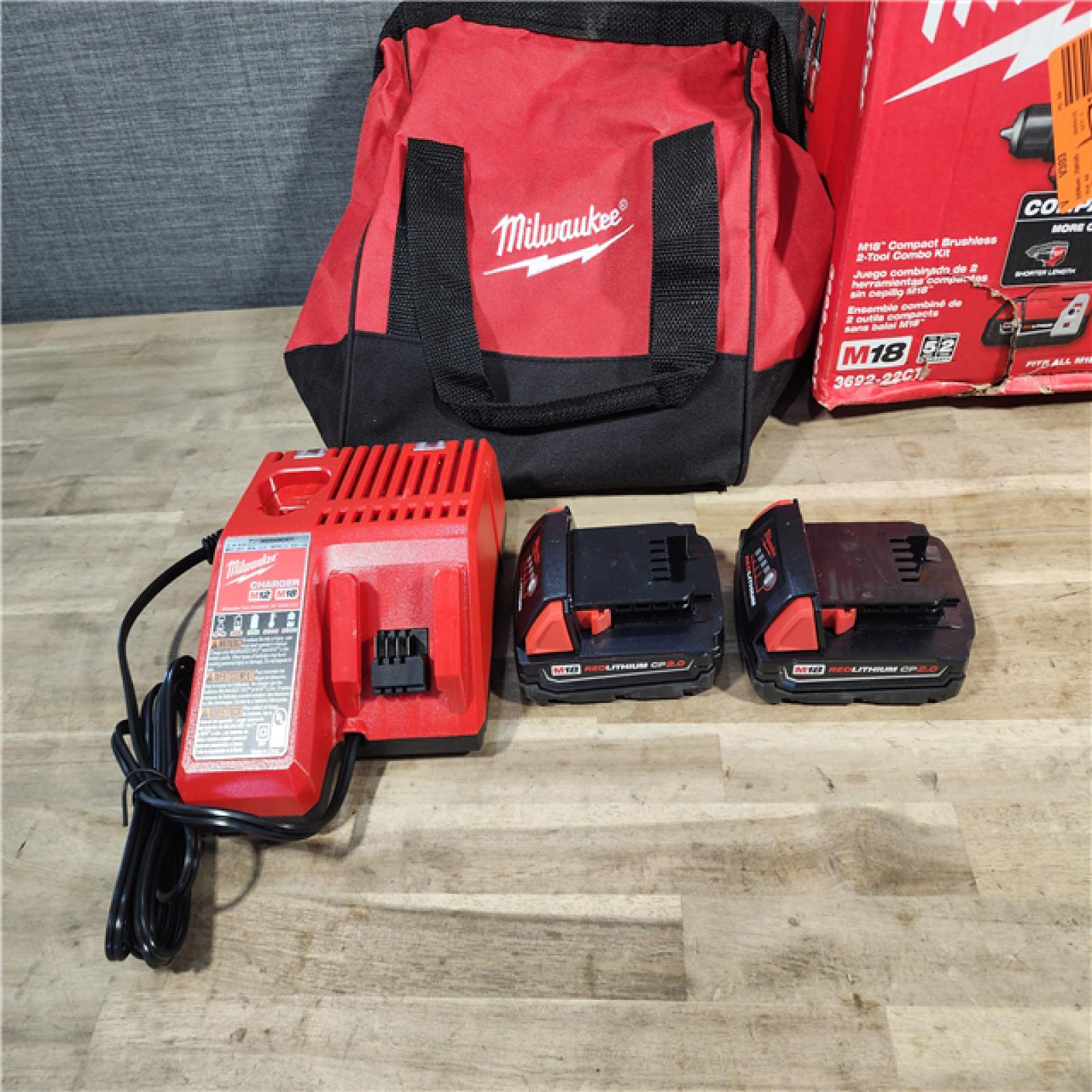 HOUSTON LOCATION - AS-IS Milwaukee M18 18V Lithium-Ion Brushless Cordless Compact Drill/Impact Combo Kit (2-Tool) W/(2) 2.0 Ah Batteries, Charger & Bag