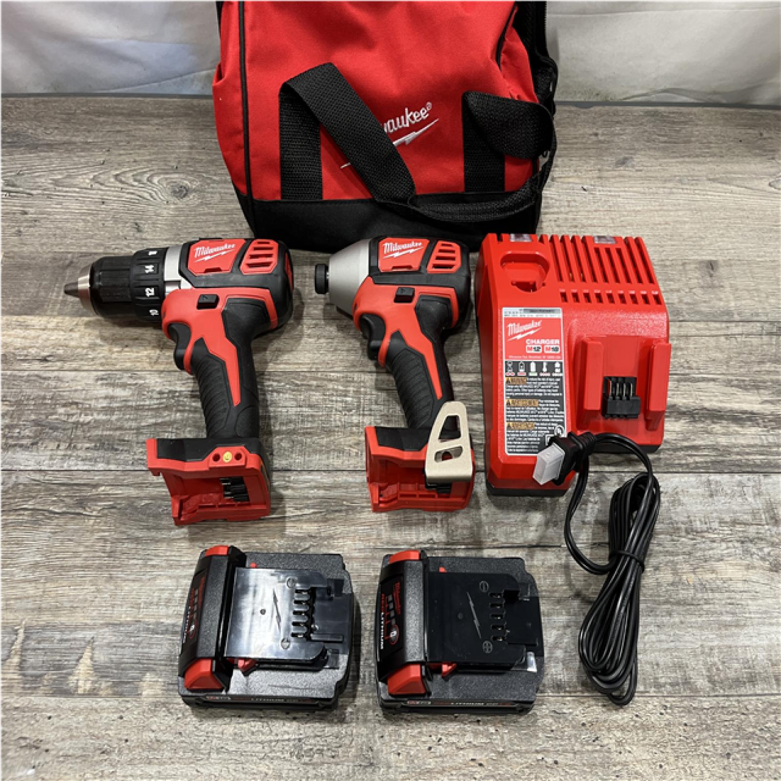 AS-IS Milwaukee 18V Lithium-Ion Cordless Drill Driver/Impact Driver Combo Kit