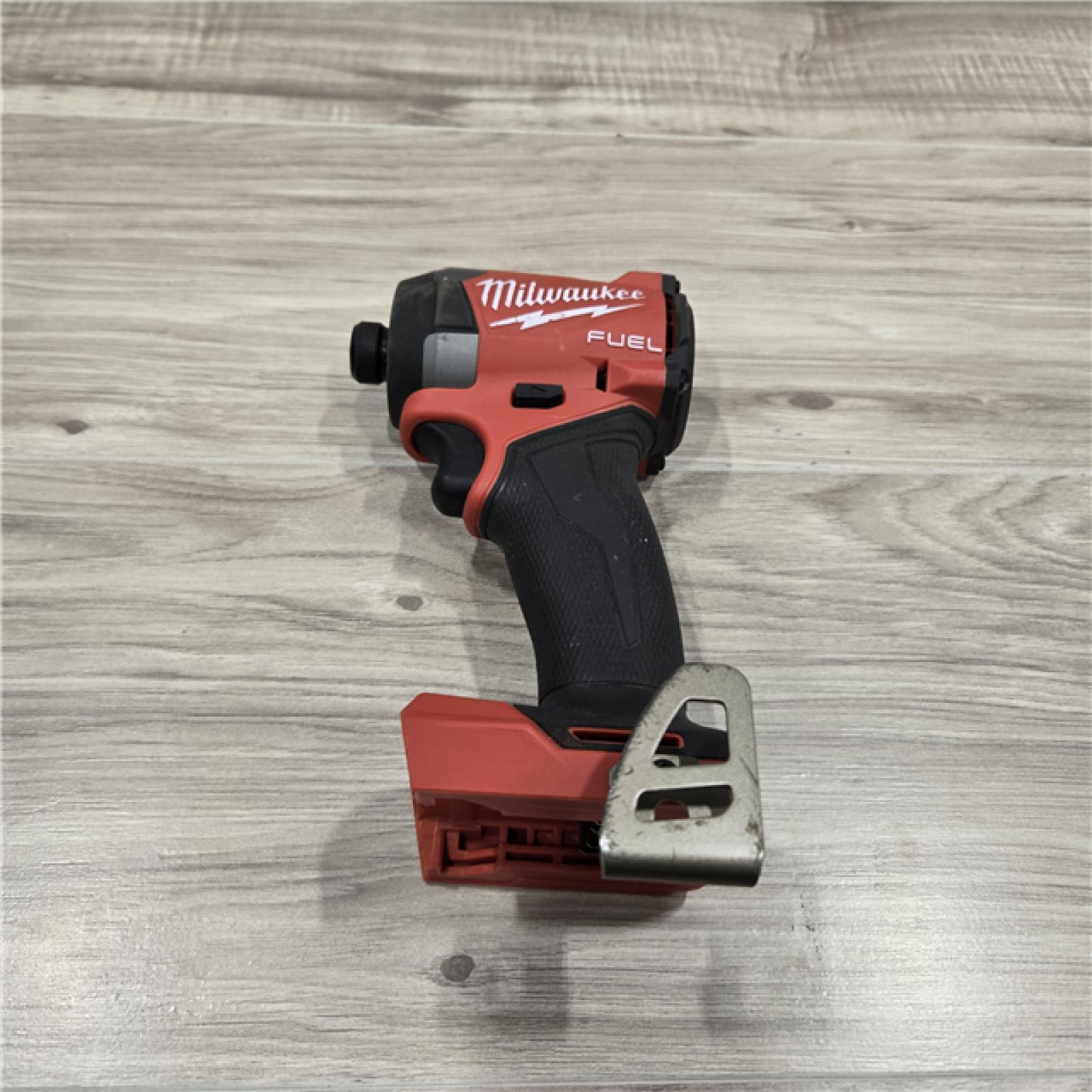 AS-IS Milwaukee 2953-20 18V Lithium-Ion Brushless Cordless 1/4   Hex Impact Driver Bare Tool  Red