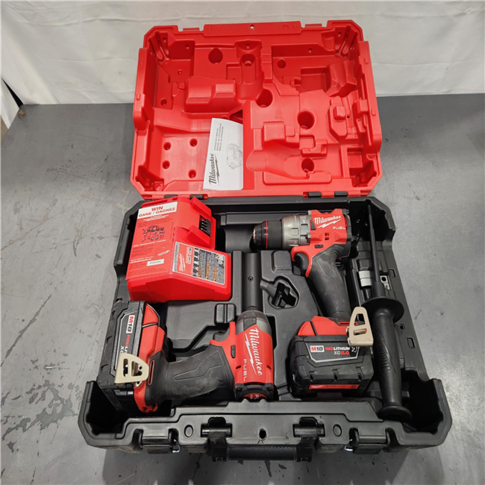 AS-IS- Milwaukee M18 FUEL 18V Lithium-Ion Brushless Cordless Hammer Drill and Impact Driver Combo Kit