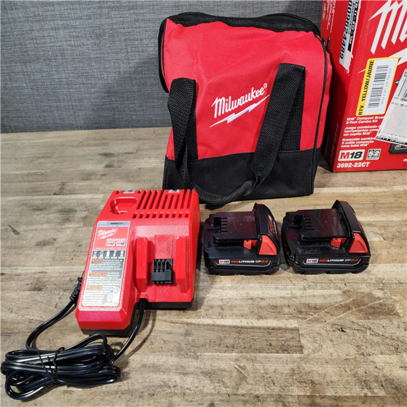 HOUSTON LOCATION - AS-IS Milwaukee M18 18V Lithium-Ion Brushless Cordless Compact Drill/Impact Combo Kit (2-Tool) W/(2) 2.0 Ah Batteries  Charger & Bag