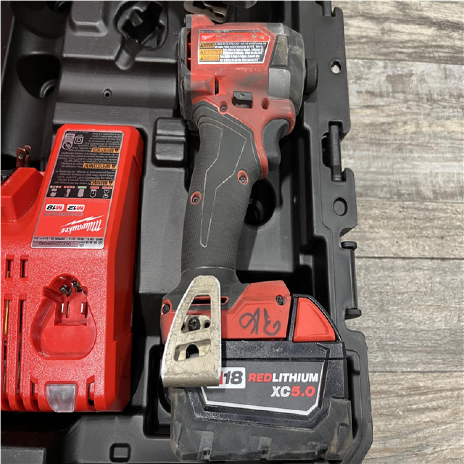 AS-IS Milwaukee FUEL 18V Lithium-Ion Brushless Cordless Hammer Drill and Impact Driver Combo Kit