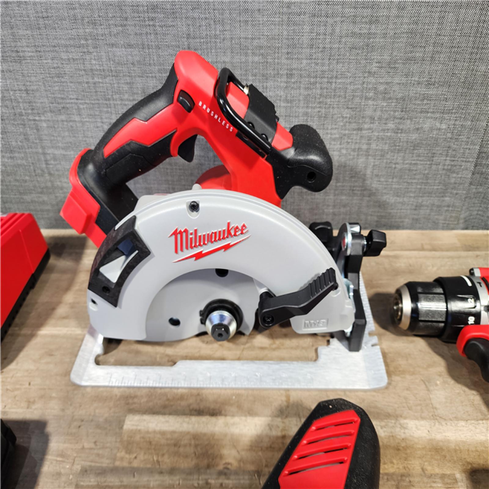 HOUSTON LOCATION - AS-IS Milwaukee M18 18-Volt Lithium-Ion Brushless Cordless Combo Kit (3-Tool) with 2-Batteries  1-Charger and Tool Bag