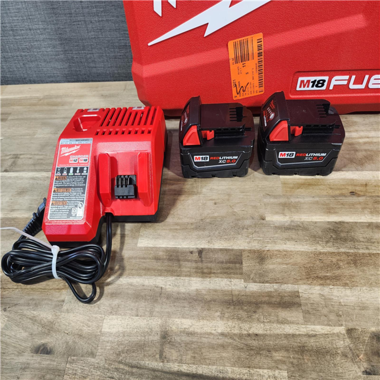 HOUSTON LOCATION - AS-IS (APPEARS LIKE NEW) MILWAUKEE M18 FUEL 18V Lithium-Ion Brushless Cordless Hammer Drill and Impact Driver Combo Kit (2-Tool) with 2 Batteries