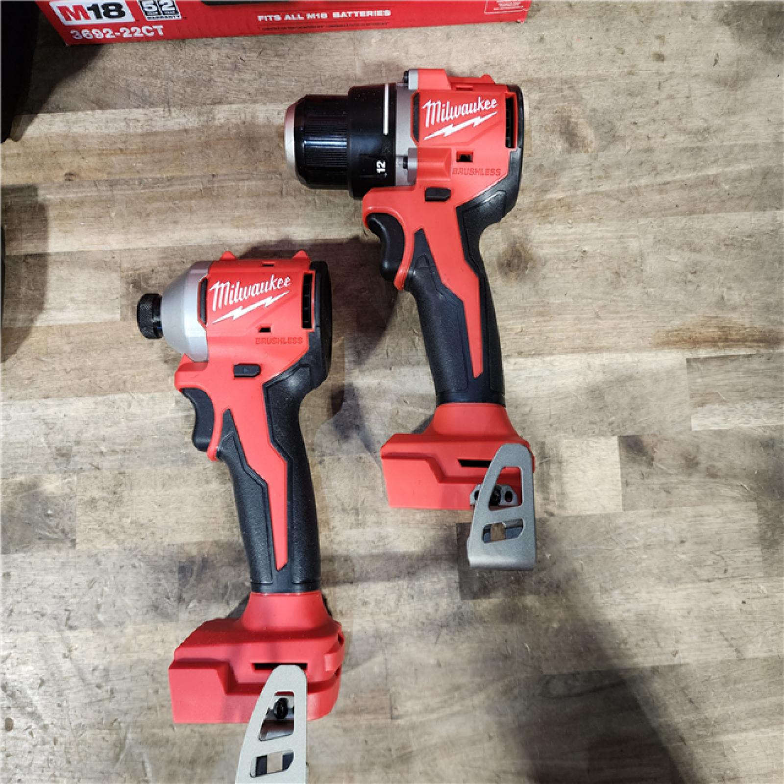 HOUSTON LOCATION - AS-IS Milwaukee M18 18V Lithium-Ion Brushless Cordless Compact Drill/Impact Combo Kit (2-Tool) W/(2) 2.0 Ah Batteries  Charger & Bag