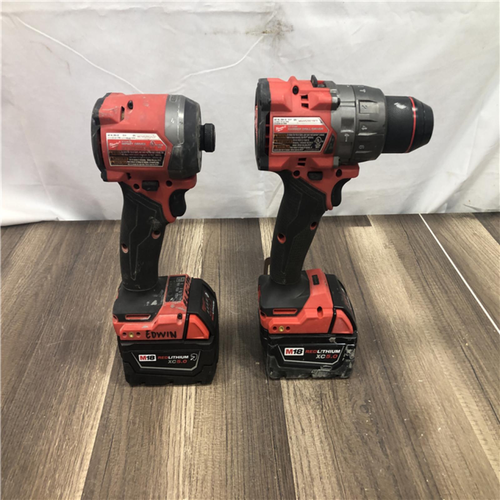 AS-IS Milwaukee FUEL 18V Lithium-Ion Brushless Cordless Hammer Drill and Impact Driver Combo Kit