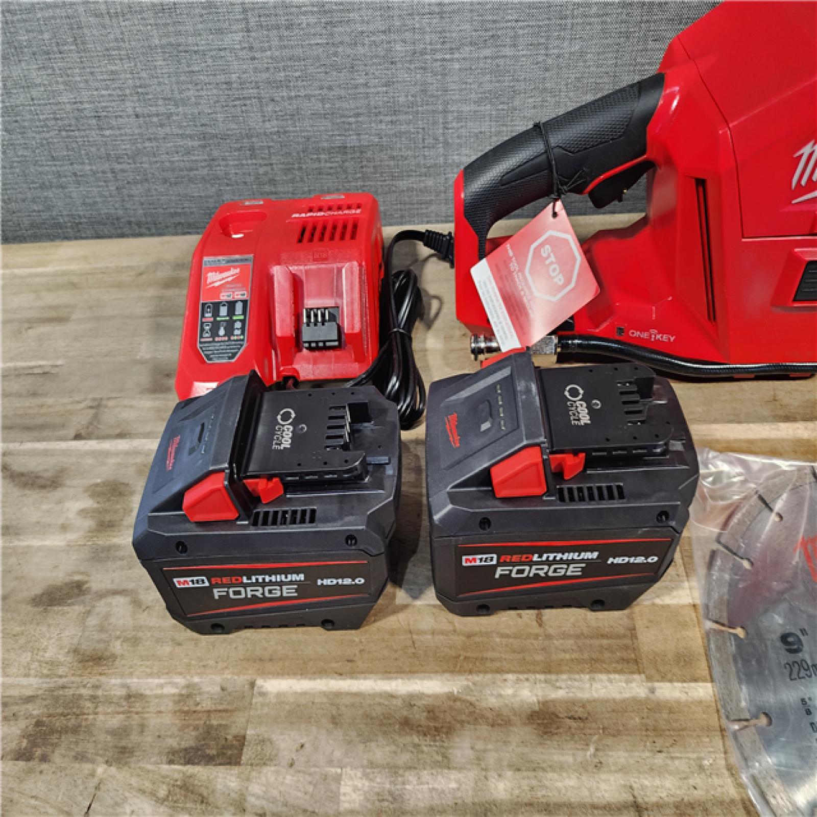 HOUSTON LOCATION - AS-IS (APPEARS LIKE NEW) Milwaukee M18 FUEL ONE-KEY 18-Volt Lithium-Ion Brushless Cordless 9 in. Cut Off Saw Kit W/ (2) 12.0Ah Batteries & Rapid Charger