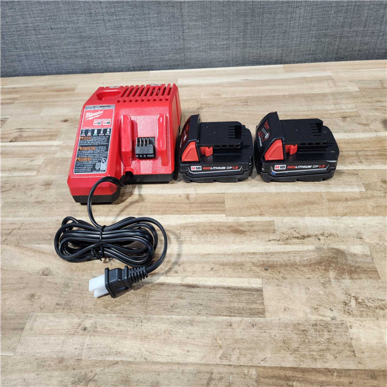 HOUSTON LOCATION - AS-IS Milwaukee 18V Lithium-Ion Cordless Drill Driver/Impact Driver Combo Kit